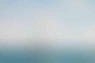 A yacht on the turquoise sea | Amalfi Coast travel photography by RollingBear Travels.