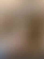 Hand holding a cone of Raki Gelato in old Sorrento | food photography by RollingBear Travels.