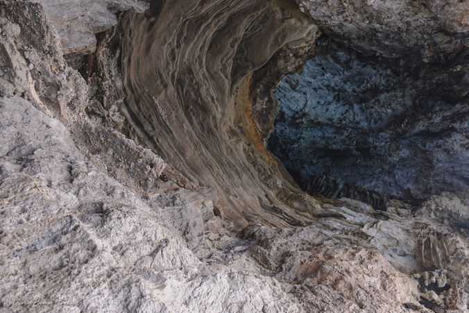 Layered stone and blue tinge of Capri's sea caves | RollingBear Travels.