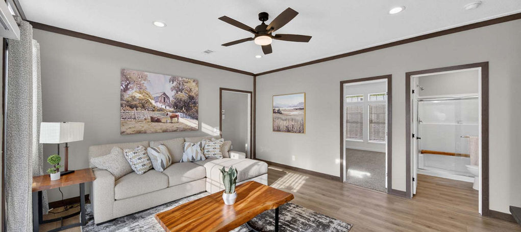 Modern living room at The Dogwood with sofa and coffee table.
