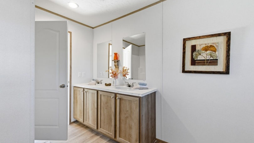Modern bathroom double vanity with wooden cabinets