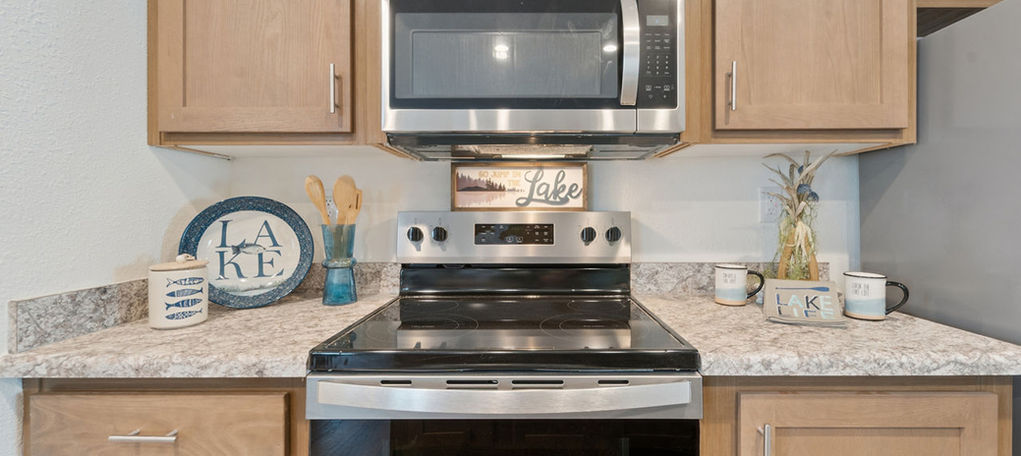 Modern kitchen at The Wellington with stainless appliances