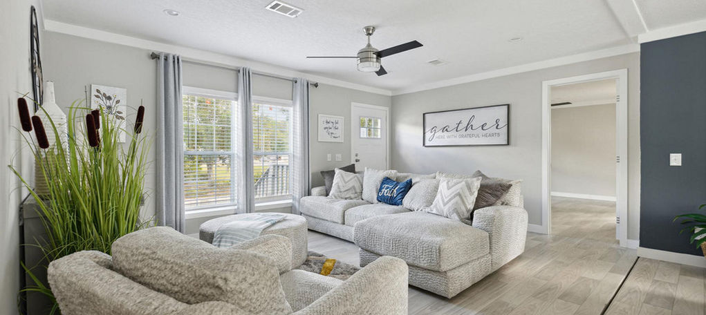 Modern living room at The Southport with sectional sofa.