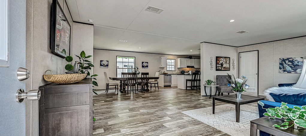 Open-concept living, dining, and kitchen area