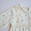 Thumbnail: Bird Print Cotton Muslin Dress in Cream Side View