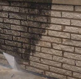 Pressure washing a brick wall Carrollton