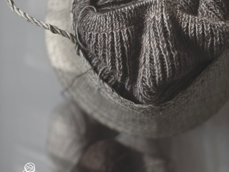 Cozy knitting corner with yarn basket