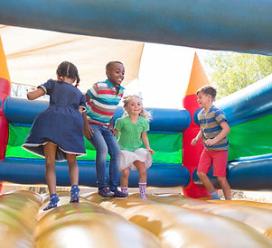 Children Playing on Bouncy Castle