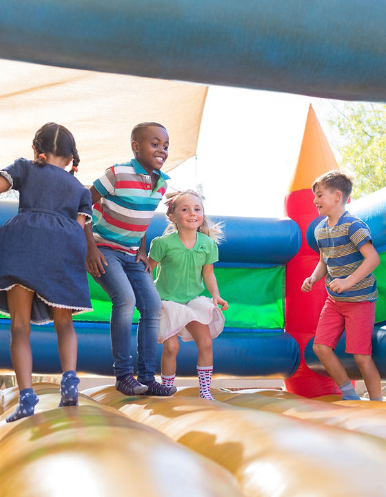 Children Playing on Bouncy Castle