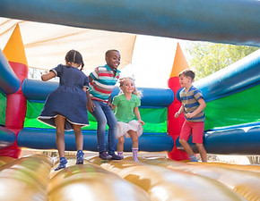 Children Playing on Bouncy Castle