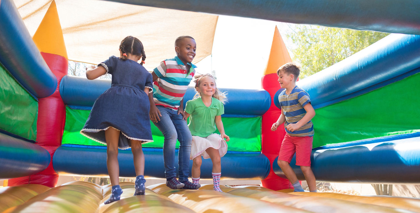 Children Playing on Bouncy Castle