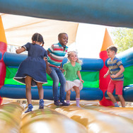 Children Playing on Bouncy Castle