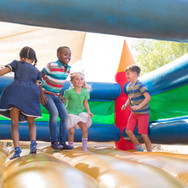 Children Playing on Bouncy Castle