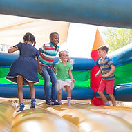 Children Playing on Bouncy Castle