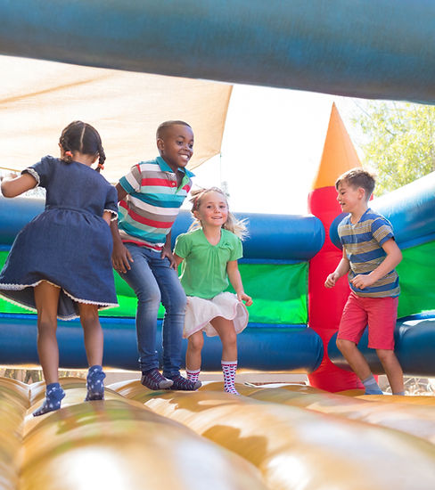 Children Playing on Bouncy Castle