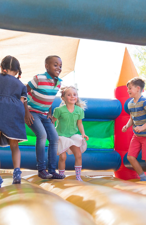 Children Playing on Bouncy Castle