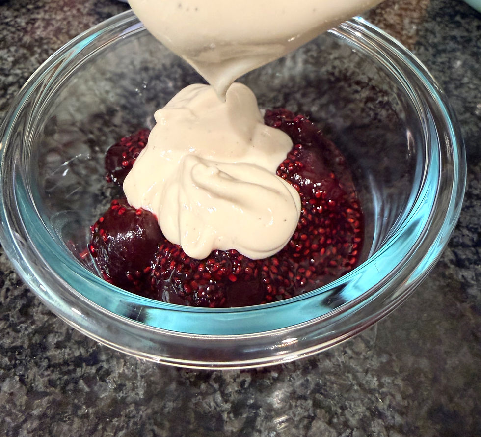 Topping the cherry chia seed jam with yogurt.