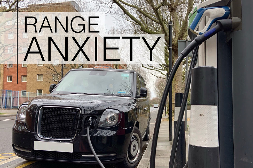 Black car charging at a station on a tree-lined street. Large text "RANGE ANXIETY" overlays the scene, conveying concern about electric vehicle range.
