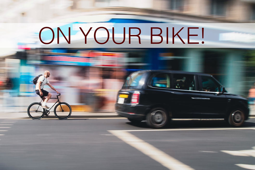 Cyclist rides past a black taxi on a blurred city street with the slogan ONLY YOUR BIKE! overhead.