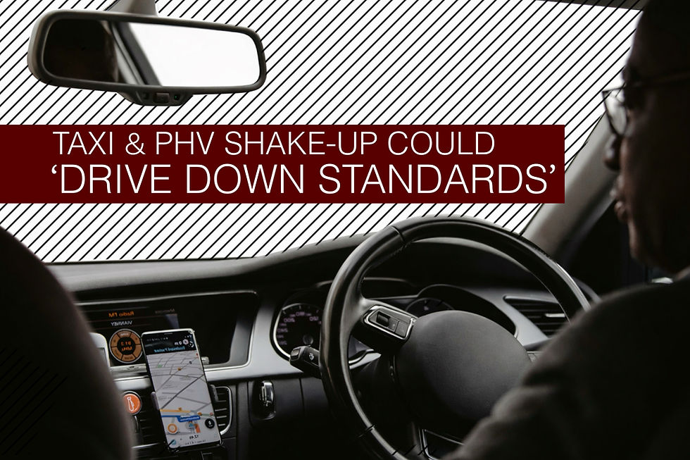 Driver in a car interior with a phone on the dashboard. Text reads "Taxi & PHV shake-up could ‘drive down standards’" on a striped background.