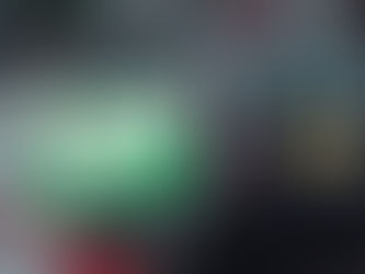 What are these green and yellow cards on the windscreen of a London taxi?