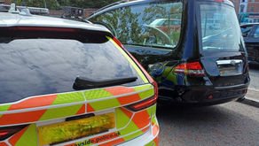 Hearse driver reported by Merseyside Police after mobile phone use behind wheel
