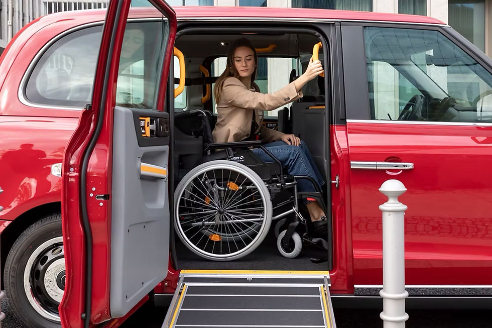 Woman in wheelchair exiting red LEVC TX taxi via ramp, holding door handle. Background shows a building façade. Mood is focused and determined.