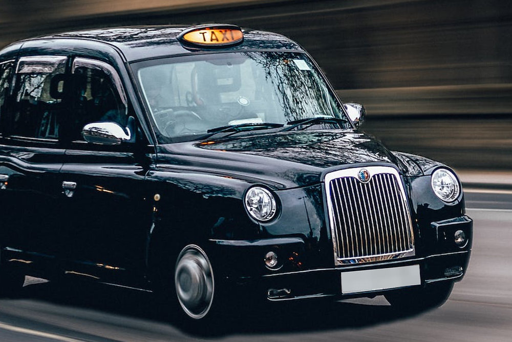 How do taxi BILKING laws differ in England and Scotland?