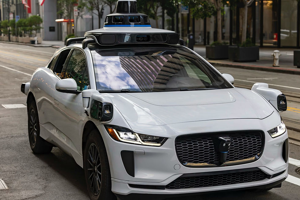 Waymo Self-driving white car on urban street with sensors on roof and sides. Reflections of buildings in windows. Modern cityscape background.