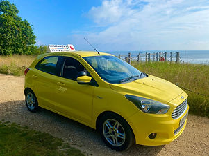 Driving school car sea front
