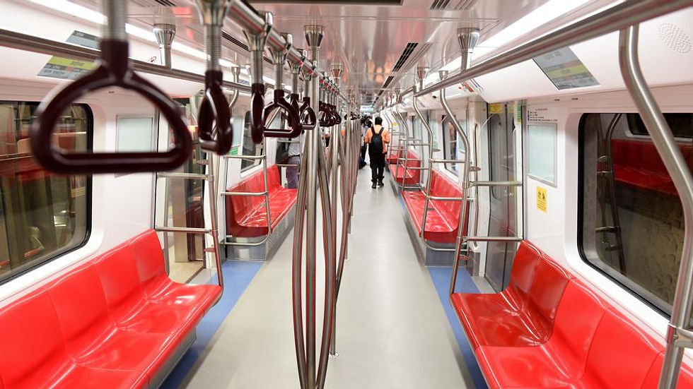 An inside view of the Metro coaches with seats and handrails