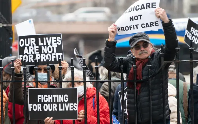 City retirees protest outside City Hall in 2023 in response to the Adams administration's Medicare Advantage plan. (Barry Williams for New York Daily News)