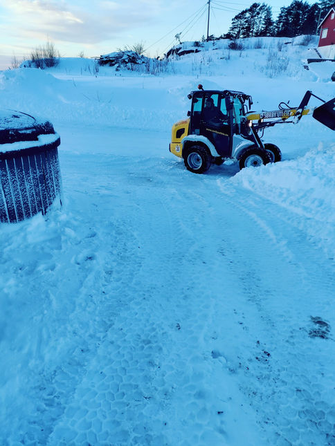 snøbrøyting med hjullaster