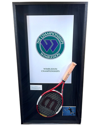 Roger Federer's 2006 Match Used Signed Wilson Racket from