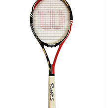Roger Federer's 2011 French Open Final Racket Up for Auction