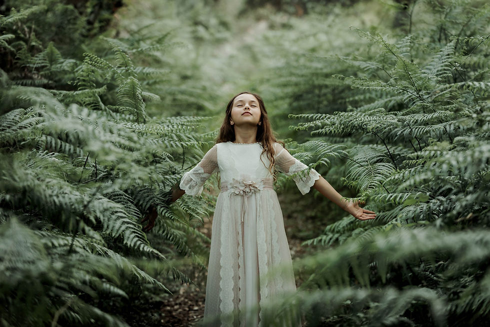 free-photo-of-a-girl-in-a-white-dress-standing-in-a-forest-with-eyes-closed.jpeg