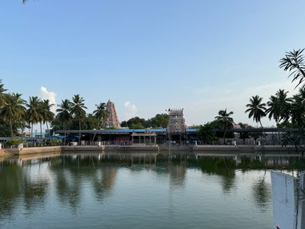 Photograph of the Pillayarpatti Vinayagar temple from the north across for the temple tank. 