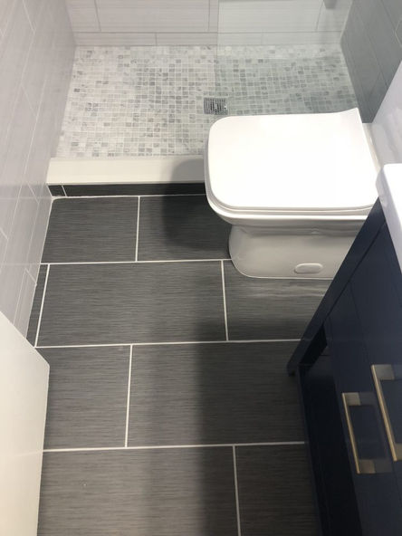 bathroom stone floor.jpeg