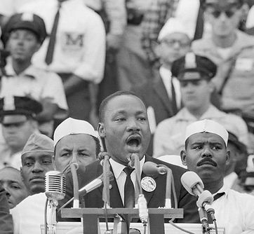 Martin Luther King speaking, representing the right to petition government to redress grievances