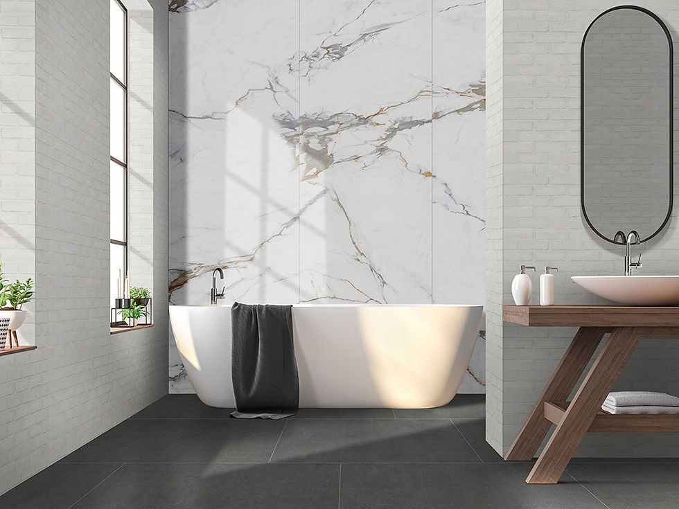 Bathroom with a freestanding white tub in front of a marble-look porcelain slab wall, large dark gray matte porcelain floor tile, and a wood vanity with a vessel sink