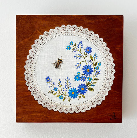 'Small Wonders'
Available at Aspire Gallery
53 Kennedy Terrace,
Paddington Qld 4064
The Petite Pieces:The 100 Exhibition runs from 18th July - 15th August 2026
Acrylic Painting on Cradled Wood Panel
20cm x 20cm
A sweet painting of a doily with embroidered flowers. A bee has landed on the doily to rest.