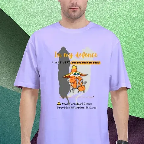Certified Chaos oversized lavender streetwear t-shirt with “In My Defence I Was Left Unsupervised” text print, premium fit.