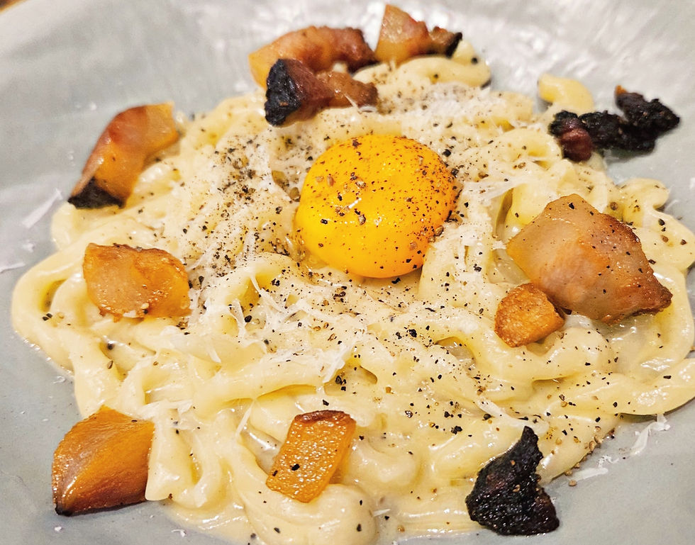 Perched in the center of the Pici Carbonara is a runny kampong egg sits surrounded by creamy egg sauce, cooked to perfection at 63 degree.