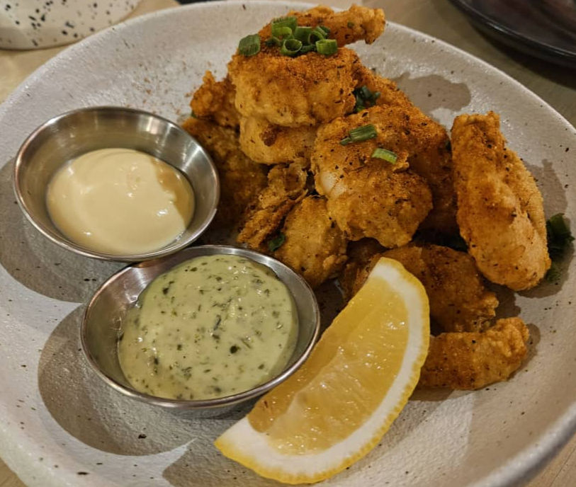 The Cajun Fried Shrimp are succulent, fresh morsels best devoured with the savory side dips.