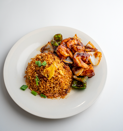Shrimp stir fried with soy sauce, onions and bell peppers.