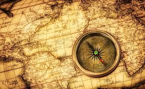 Sepia world map with compass