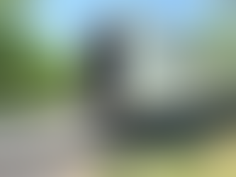 XD Moving Solutions professional mover loading furniture into moving truck with ramp, residential moving services.