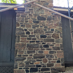 Granite chimney rebuilt and repointed