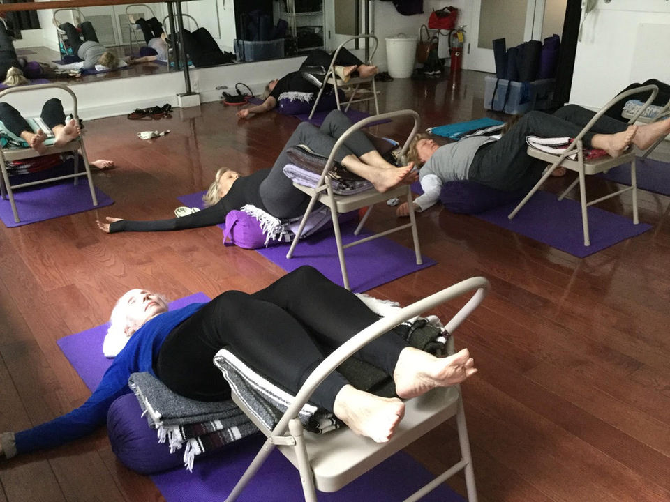 YogaNorma Viparita Karani with Chair in-person class Upper East Side