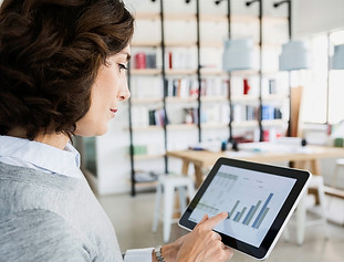 Woman%20Checking%20Data%20on%20Tablet_ed